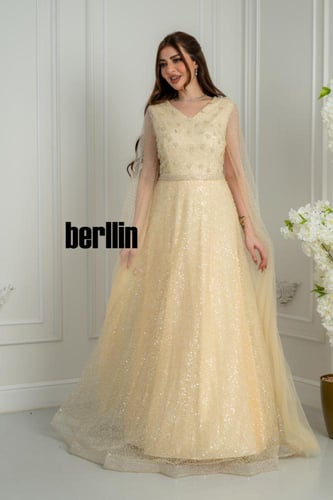 فستان سهرة طويل سديم الشامبين المطرز بزهور اللؤلؤ...