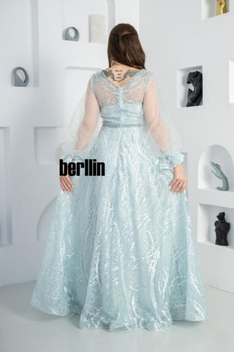 فستان سهرة ماكسي مميز بكم بف وبقصة واسعة لون سماوي