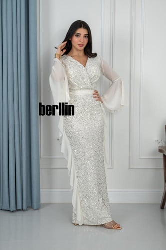 فستان سهرة ترتر بأكمام طويلة واسعة لون ابيض