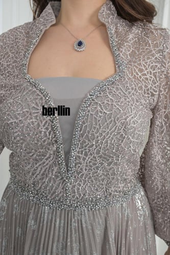 فستان سهرة طويل مميز بكم بف منفوخ فخم وبقصة واسعة