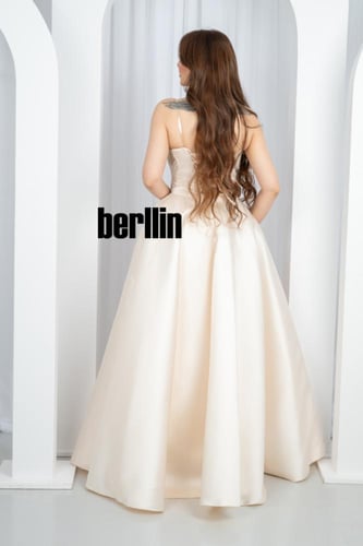 فستان سهرة العاج الملكي بتطريز ذهبي ولمعان ميكادو...