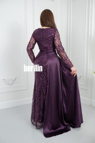 فستان سهرة موف بتطريز ترتر مع تصميم أنيق وأكمام شف...