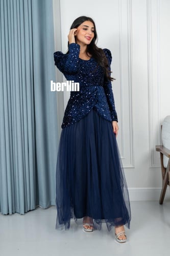 فستان سهرة طويل ترتر مميز بقصة كلوش تل لون كحلي