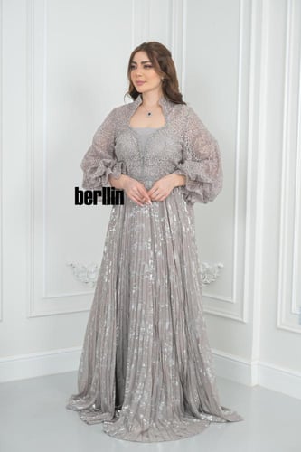 فستان سهرة طويل مميز بكم بف منفوخ فخم وبقصة واسعة