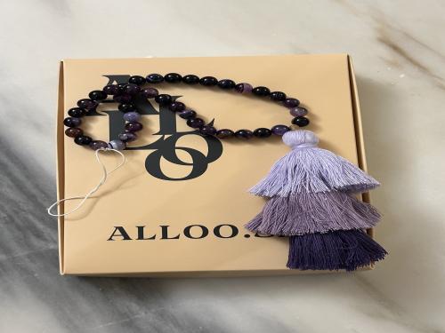 تعليقة للجوال بنفسجي