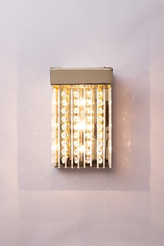 جداري مودرن بتعليقات كريستال وزجاج لون ذهبي