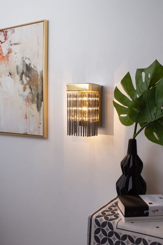 جداري مودرن بتعلقات زجاجية لون ذهبي