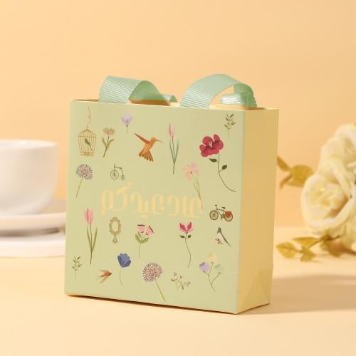 أكياس توزيعات العيد "عاد عيدكم" لون تفاحي-(12)حبة...