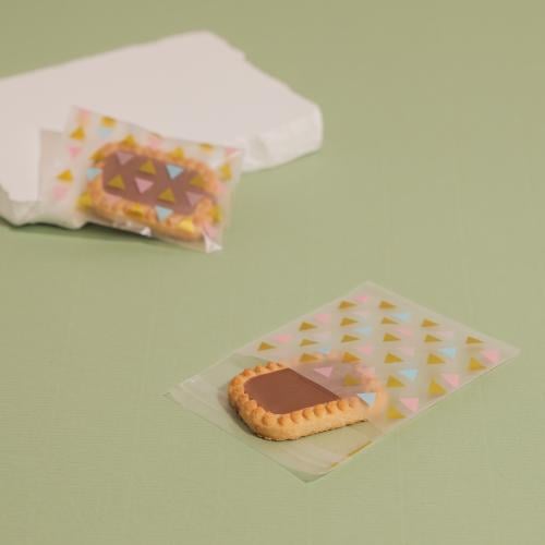 مجموعة (100) كيس شفاف ثلجي للكوكيز والحلويات بألوا...