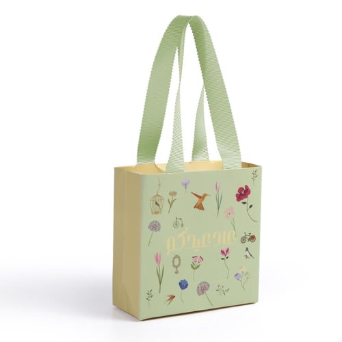 أكياس توزيعات العيد "عاد عيدكم" لون تفاحي-(12)حبة...