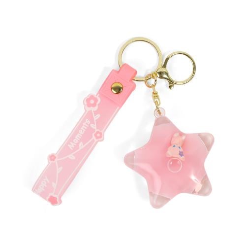 تعليقة شنط بشكل نجمة باللون الوردي