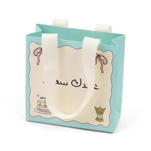 مجموعة (12)كيس توزيعات العيد" عيدك سعيد" باللون ال...