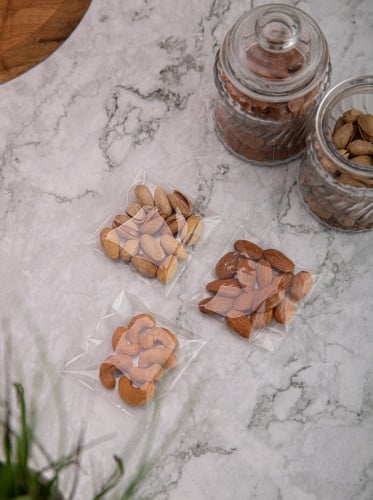 مجموعة(100)كيس بلاستيك شفاف بلاصق