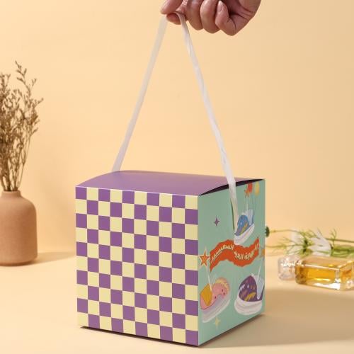 علبة توزيعات للعيد مع مسكة علوية "عساكم من عوادة"...