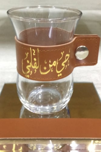 طقم ضيافة من الجلد مكون من 21 قطعة