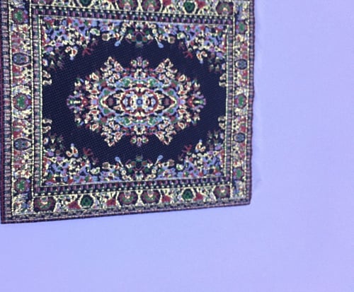 ميني كوستر بنمط سجاد شرقي