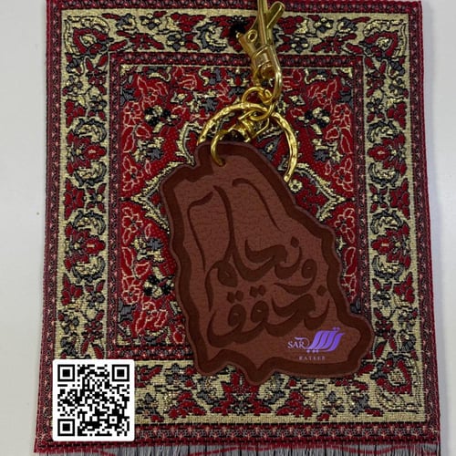 كوستر مع ميدالية اليوم الوطني