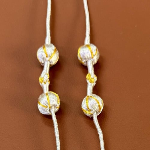 تعليقة نظارة من الزري البشت