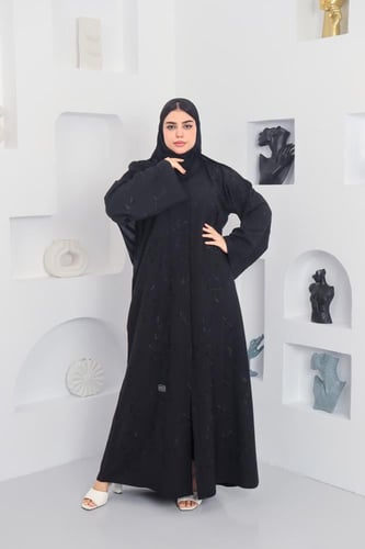 عباية كتان بتطريز دقيق في الاكمام والصدر