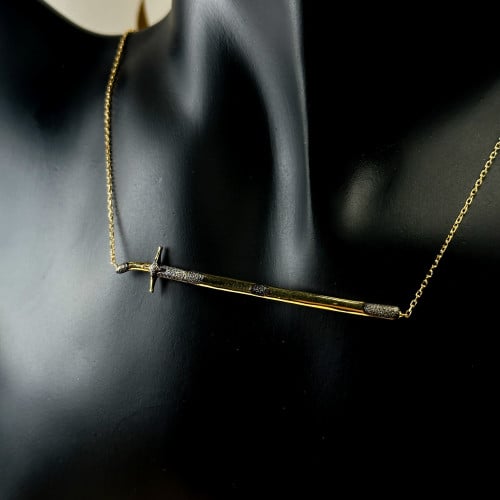 عقد السيف العربي صغير ذهب عيار18 بوزن 5.37 جم تقري...