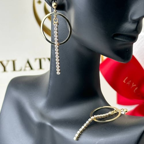 اقراط ذهب عيار18 بوزن 2.38 جم تقريبا