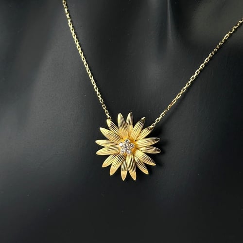 عقد ابريل زهرة الربيع ذهب عيار21