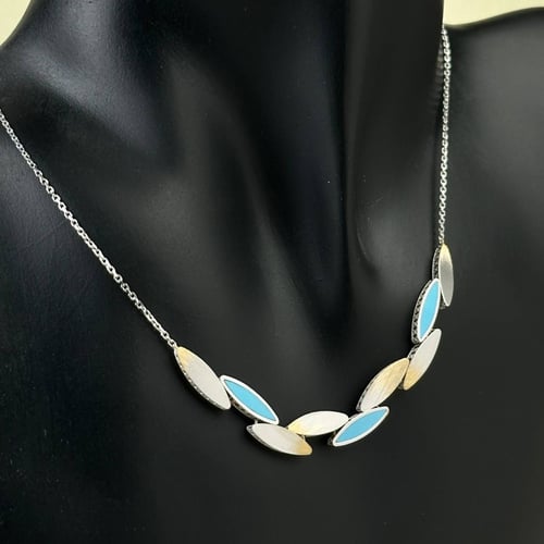 طقم ذهب عيار18 بوزن 17.21 جم تقريبا