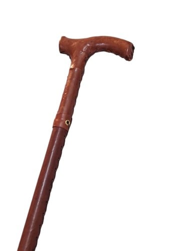 Stick covered with genuine leather; hand stitching