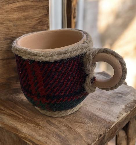 A glazed pottery cup