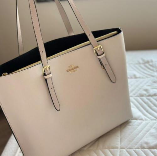 coach ( كوتش مولي بيج ابيض )