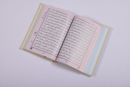 مصحف جلد بيج