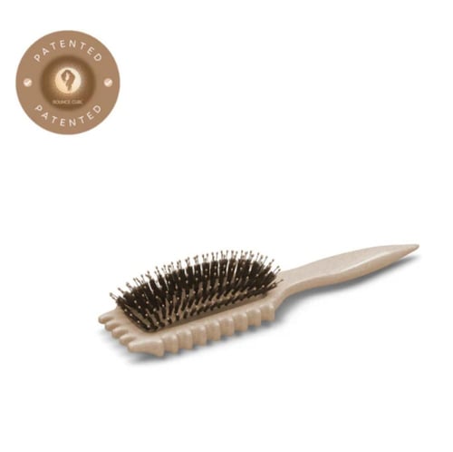 فرشاة تصفيف لتحديد الخصل الأصلية من باونس كيرل
