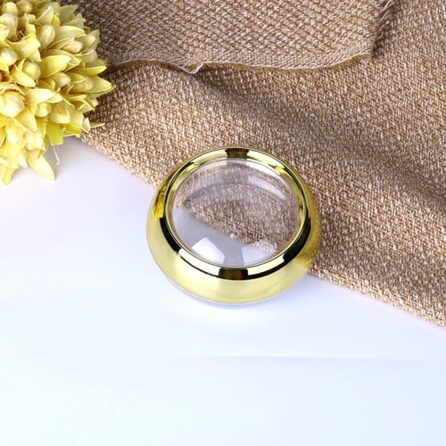 علب زعفران شفافة بغطاء ذهبي