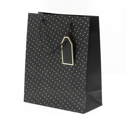 أكياس هدايا منقطة بألوان متعددة