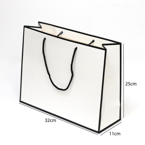 أكياس هدايا ورقية فاخرة بحواف سوداء