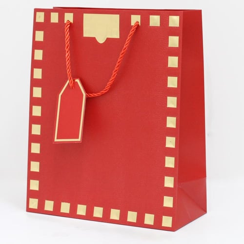 أكياس هدايا مزخرفة بإطار ذهبي