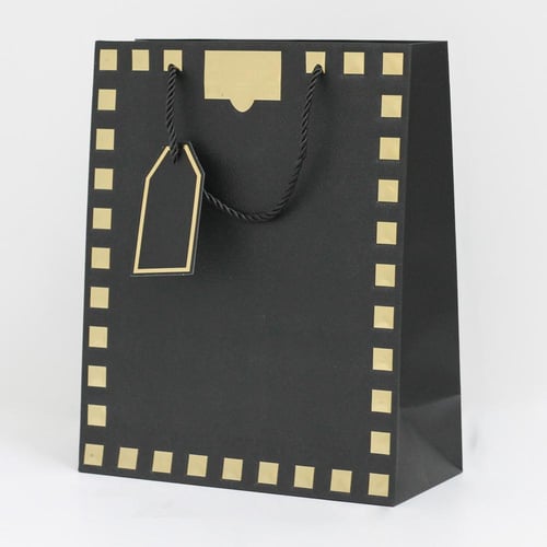 أكياس هدايا مزخرفة بإطار ذهبي