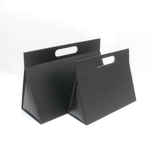 علب هدايا بشكل شنطة