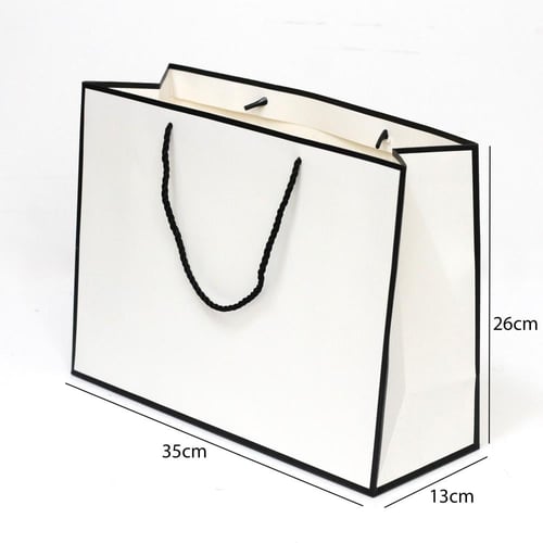 أكياس هدايا ورقية فاخرة بحواف سوداء