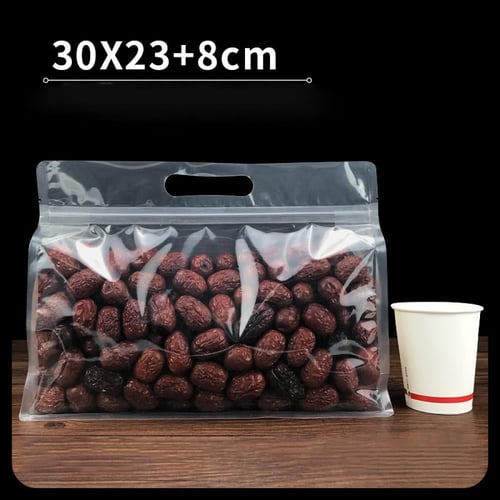 اكياس قهوة ومكسرات شفافة بيد