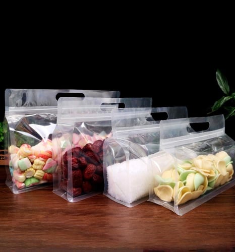 اكياس قهوة ومكسرات شفافة بيد