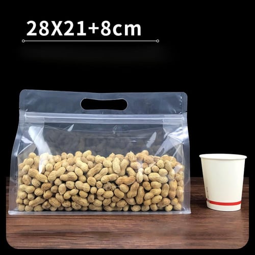 اكياس قهوة ومكسرات شفافة بيد