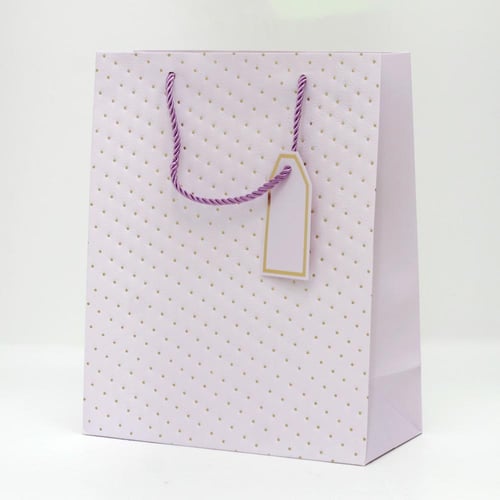 أكياس هدايا منقطة بألوان متعددة