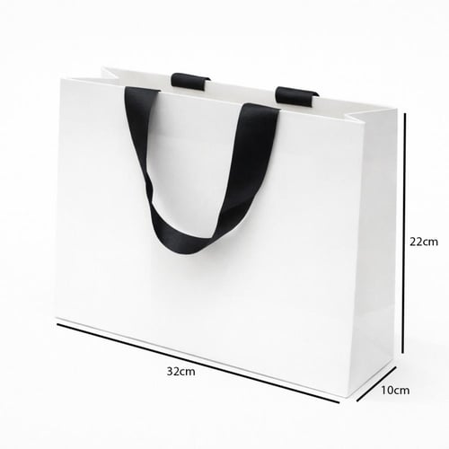 أكياس هدايا ورقية بمقبض شريطة عريض