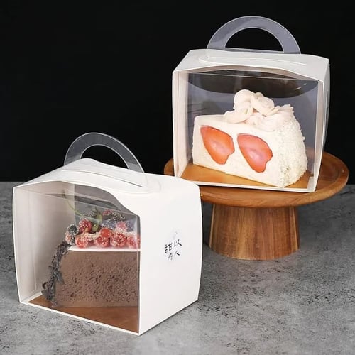 علب كيك شفافة بإطار أبيض بمسكه