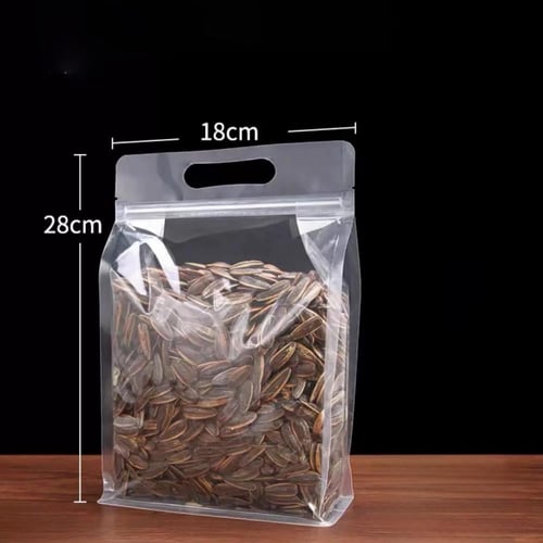 اكياس قهوة ومكسرات شفافة بيد