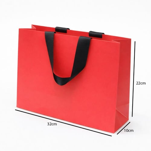 أكياس هدايا ورقية بمقبض شريطة عريض