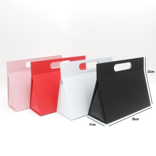 علب هدايا بشكل شنطة