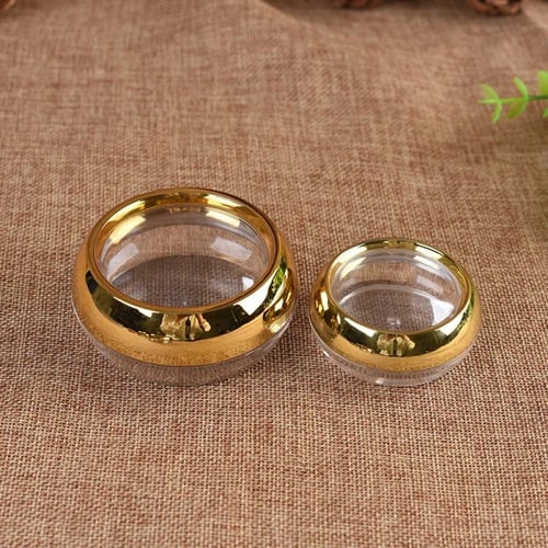 علب زعفران شفافة بغطاء ذهبي