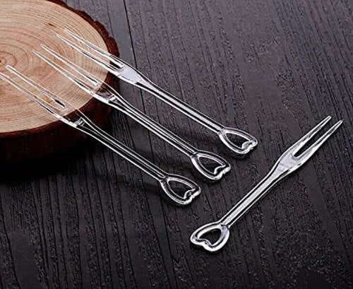 تغريسات شفافة لتزيين المشروبات والحلويات على شكل ق...